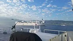 The USCGC Margaret Norvell (WPC 1105) and USCGC Kathleen Moore (WPC 1109) escort the USNS Comfort (T-AH 20) into Port-au-Prince, Haiti for Operation Enduring Promise 2019.