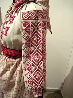 A Rivne region shirt with a thin string of embroidery at the cuff.