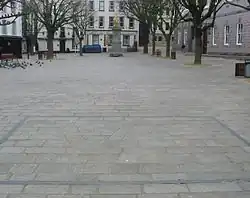 During the German occupation of Jersey, a stonemason repairing the paving of the Royal Square incorporated a V for victory under the noses of the occupiers. This was later amended to refer to the Red Cross ship Vega. The addition of the date 1945 and a more recent frame has transformed it into a monument.