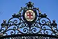 Brown's coat of arms decorates the gate