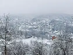 Panorama shot of the village of Velika Sejanica, covered with light snow