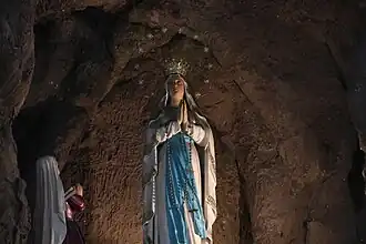 La Venerada Y Coronada Imagen de Nuestra Señora de Lourdes de Manila high altar image with Saint Bernadette Soubirous