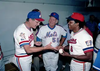 Vice President George H.W. Bush prepares to sign a baseball for Tony Oliva at an Old-Timers game in Denver in 1984. Bill Monbouquette looks on.
