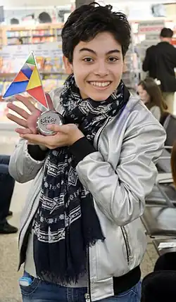 Vincenzo Cantiello in Malta International Airport with the winner's prize, after his victory (2014)