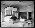 A bed with valance in the White House, Washington D.C., early 20th century