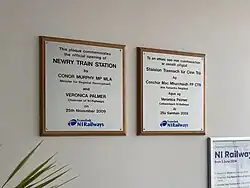 Wall plaques commemorating the opening of the new station building in 2009