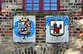 The coats of arms and the mottos (left: REGNA FIRMAT PIETAS; right: FRIEDE ERNæHRT UNFRIEDEVER ZEHRT)