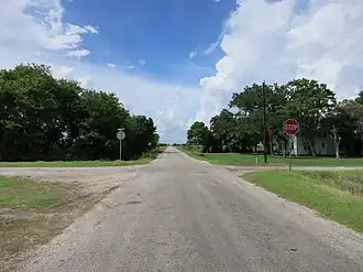 There is a single house at the Plainview crossroads.