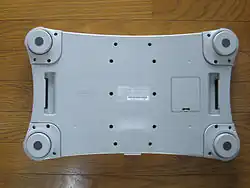 The bottom of a Wii Balance Board, without foot extensions