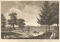 A print of an engraving showing a wooden bridge spanning a body of water, with a small group in a rowing boat