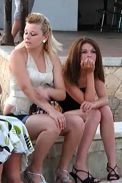 Image 111Young women in Portugal with straightened hair and thick makeup in 2007 (from 2000s in fashion)