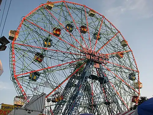 Wonder Wheel, a 45.7-metre (150 ft) tall eccentric wheel at Deno's Wonder Wheel Amusement Park, Coney Island, was built in 1920 by the Eccentric Ferris Wheel Company[180]