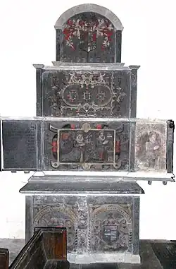 Monument to John Wrey (d.1597); originally in St Ive Church, Cornwall, but moved to St Peter's Church, Tawstock, Devon, in 1924.[2]