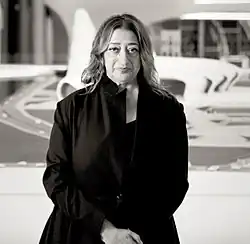 Image 21Zaha Hadid was an Iraqi architect, artist and designer, recognised as a major figure in architecture of the late 20th and early 21st centuries. She is known for being influenced by Sumerian ancient cities. (from Culture of Iraq)